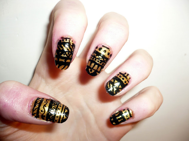 Gold aztec nail art