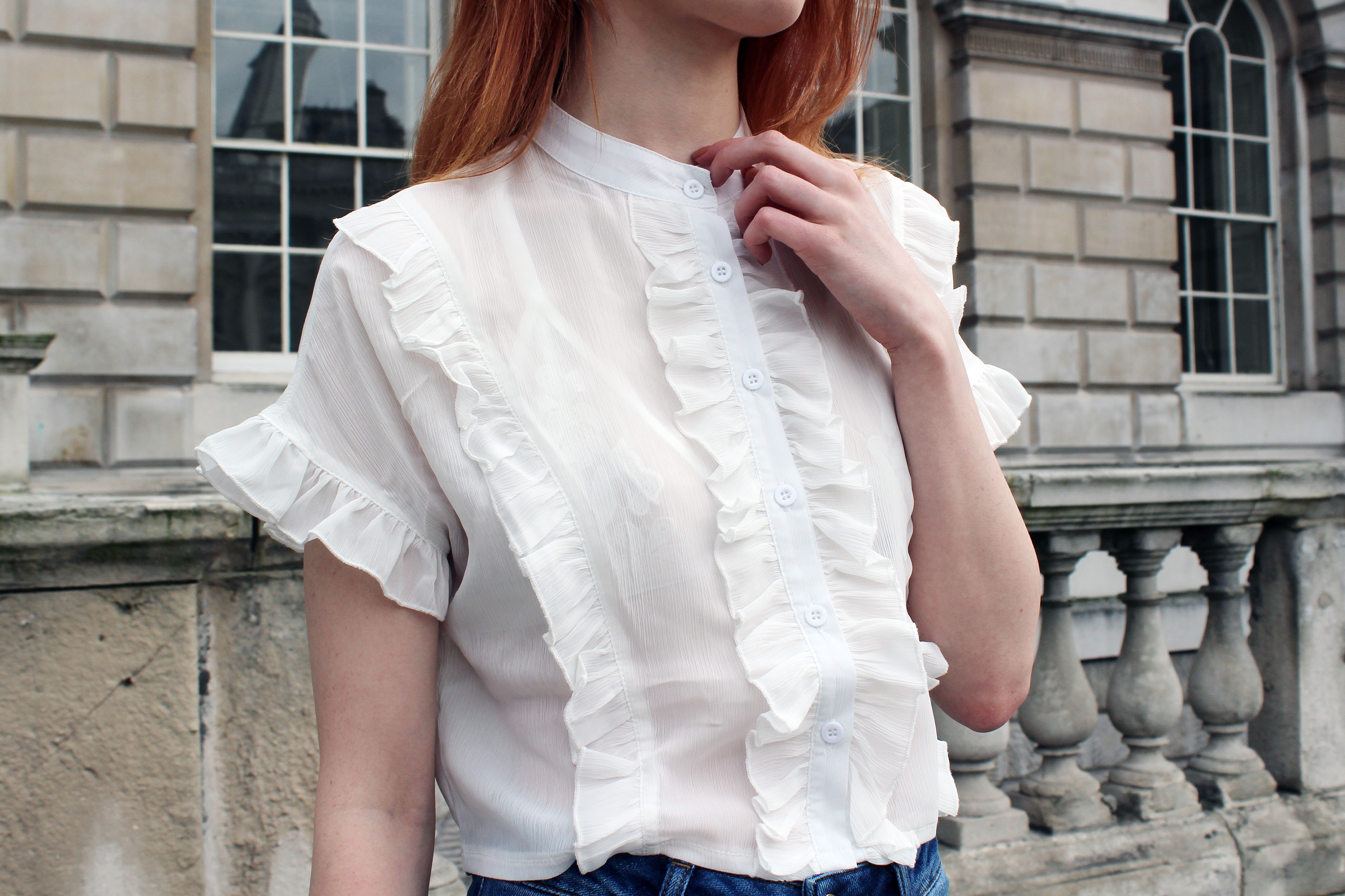 white-frilly-blouse